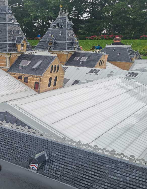 View of detailed building rooftops with metal and shingle roofing systems, highlighting craftsmanship, durability, and professional Roof Repair Wabasso, FL services.